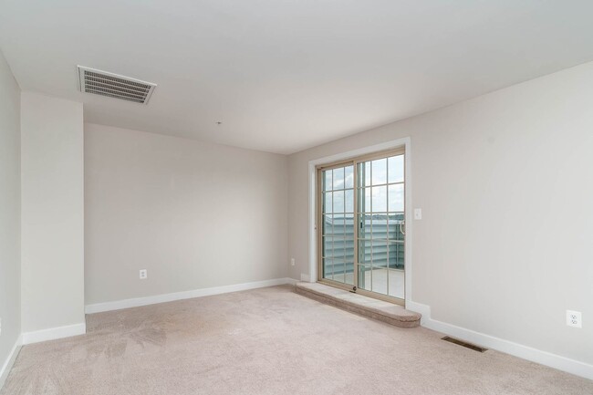 Building Photo - Townhouse with 1-Car Garage, Rooftop Deck ...