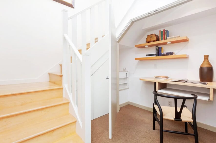 Hideaway desk, shelves & workspace are on the first level hallway area behind doors that close - 328 Harriet St