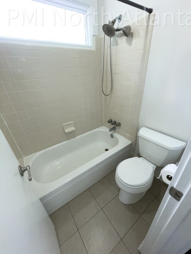 Building Photo - Pet Friendly End Unit!