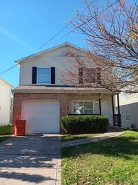 Building Photo - For Rent: Four-Bedroom, Two-Bathroom Available NOW