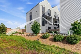 Building Photo - Spacious Townhouse with Central AC and 2-Car Garage