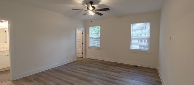 Building Photo - 5-bedroom home with 3 car garage and fully...