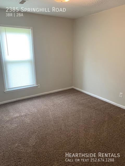 Building Photo - "Charming 3-Bedroom Home with Spacious Lay...