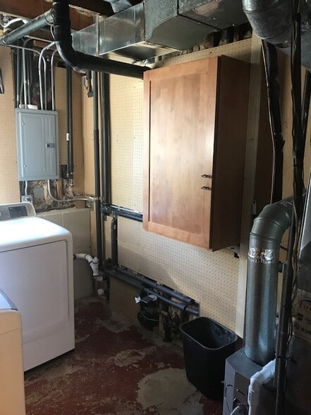 New Dryer and storage cabinet. - 512 Carlyle Ln