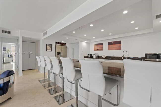 Building Photo - 5701 Collins Ave