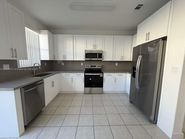 Building Photo - 5600 NW 107th Ave