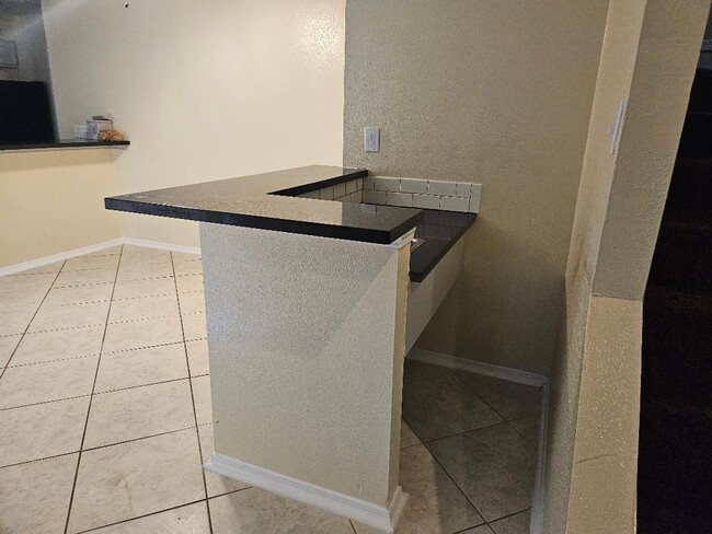 Wet Bar / Dining Area - 5822 Twisted Pine Ct Unit A