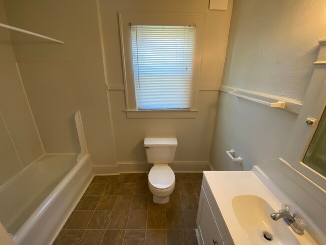 Building Photo - Huge Trinity Park Duplex with Office, Shared Fenced Yard and Adorable Porch!