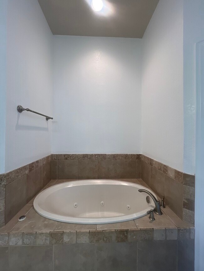 Building Photo - Meander Estates! Large corner lot 3/2/2 Coming August 2025. Covered patio!