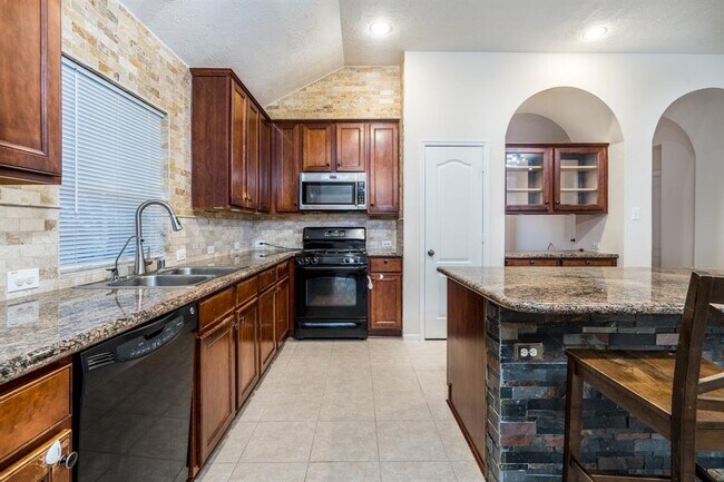 Building Photo - 9503 Tartan Manor St