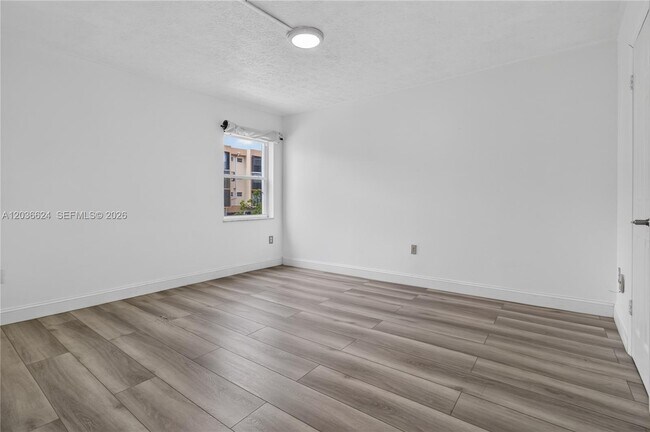 Building Photo - 6070 W 18th Ave