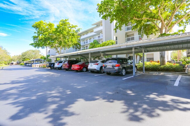 Building Photo - Live the Naples Lifestyle – Elegant 2BR/2B...