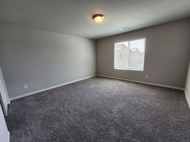 Building Photo - A Fairly New Home with 5 Bedrooms in a gated community
