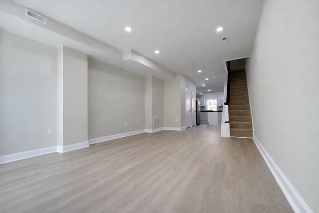 Building Photo - Modern 3BR Rowhome with Finished Lower Level & Rear Deck