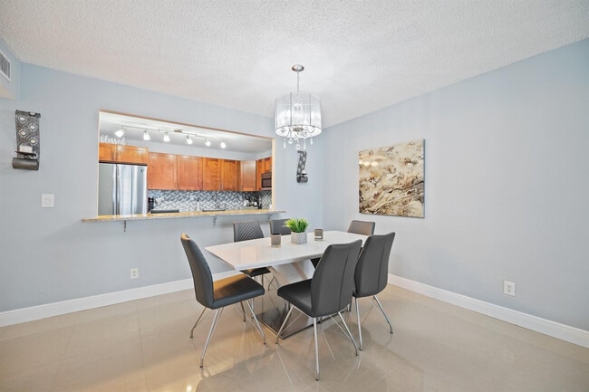 Building Photo - 19380 Collins Ave