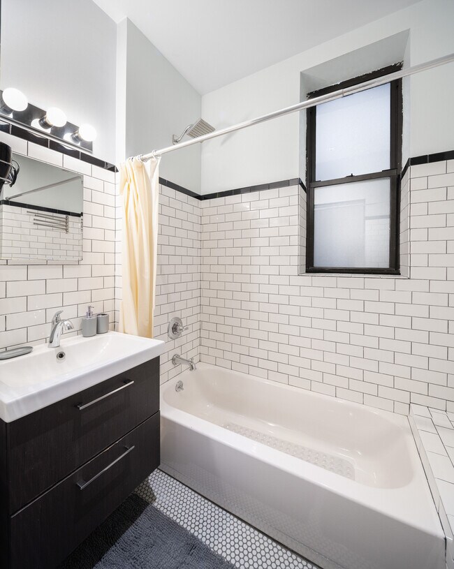 Refresh yourself in this stylish bathroom - 509 E 87th Street