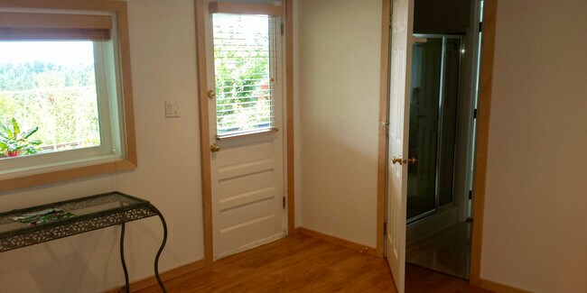 Door in/out of Apartment with bathroom door to right. - 8261 Northrop Plz SW