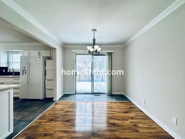 Building Photo - A Lovely Four Bedroom Home in Lenexa w/ Wood Floors, Finished Basement and a Fenced Yard!