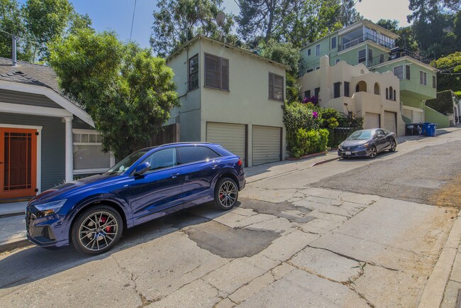 Green and beige houses are 2 front units - 6122 Glen Tower St