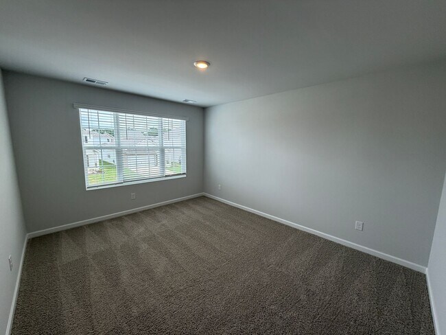Building Photo - Available in River Landing