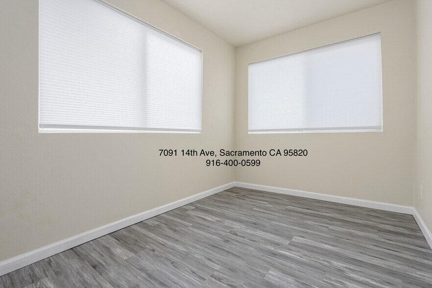 Building Photo - 7091 14th Ave