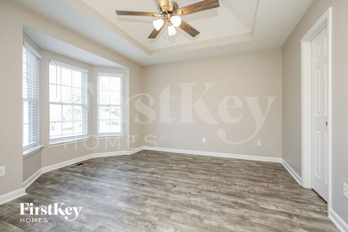 Building Photo - 105 SADDLESTONE Ct S