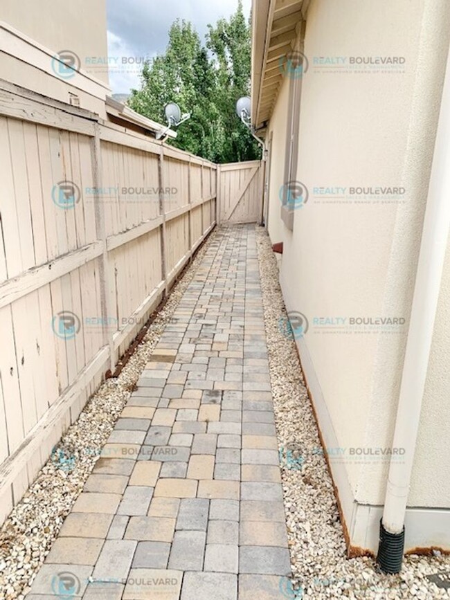 Building Photo - Step into this stunning single-story Damon...