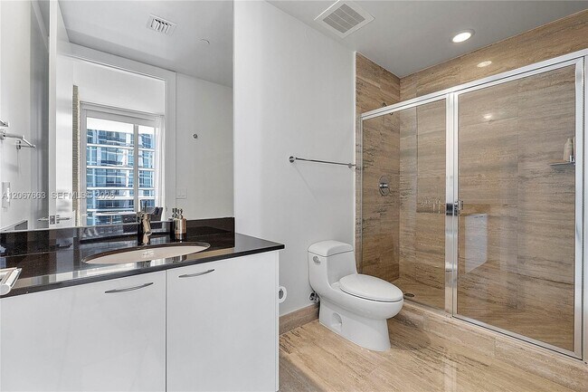 Building Photo - 15811 Collins Ave