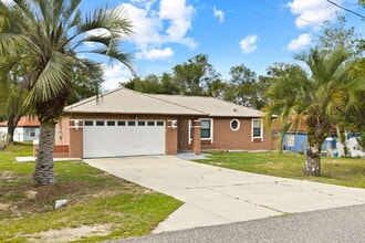 Building Photo - Comfort, Space & Convenience on a Peaceful Corner Lot in the Shores
