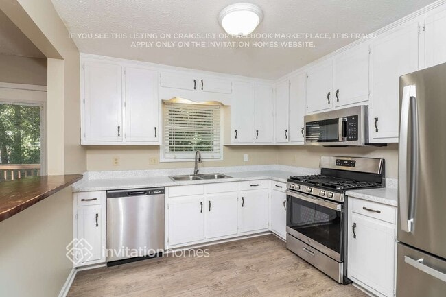 Building Photo - 9015 Sumit Wood Dr NW