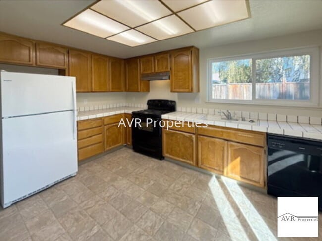 Building Photo - Gorgeous backyard with new carpets and paint