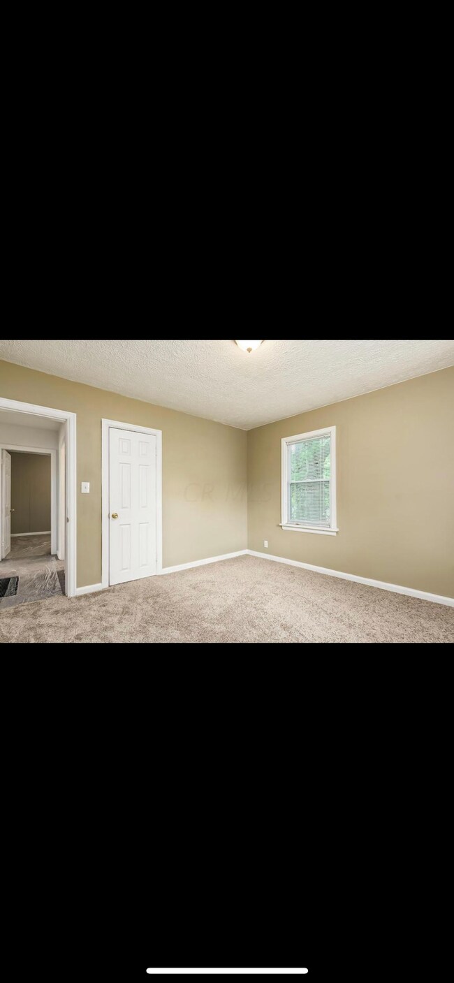 Building Photo - 1246 E 22nd Ave