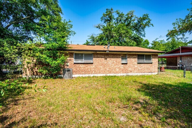 Building Photo - Timuquana 3BR/2BA Solid Brick Home w/ Flex Space & Private Yard