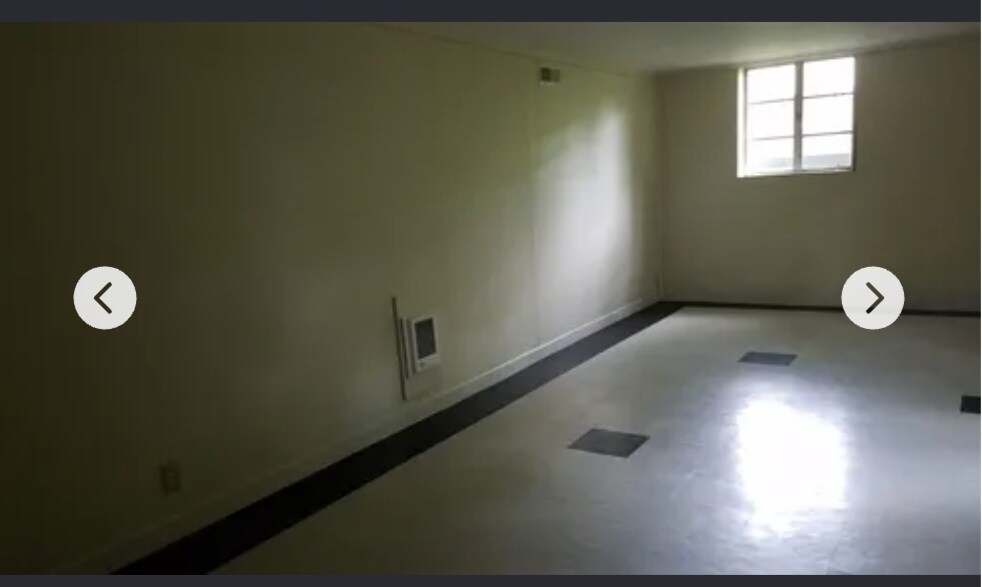Rec room has two windows looking out into yard and leads to garage - 312 Signal Mountain Blvd