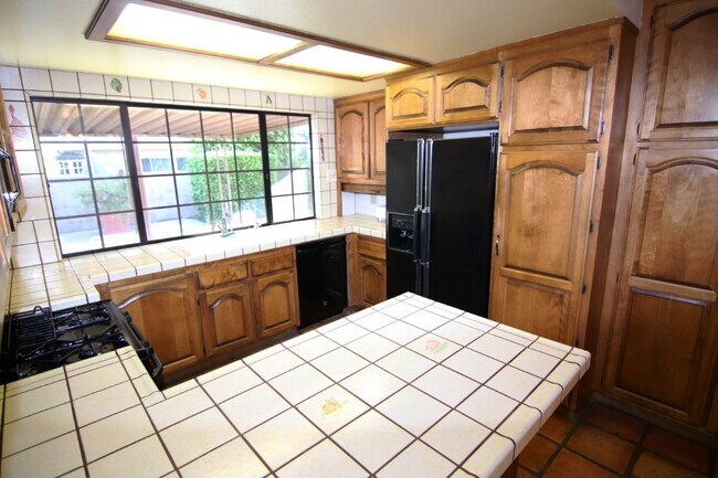 Building Photo - LA PALMA  4BR/2.5BA HOME IN HIGHLY SOUGHT AFTER NEIGHBORHOOD