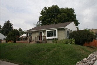 Building Photo - 3 Bedroom House with Hardwoods on West End