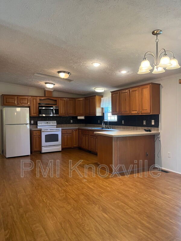 Building Photo - 8821 Trout Rd