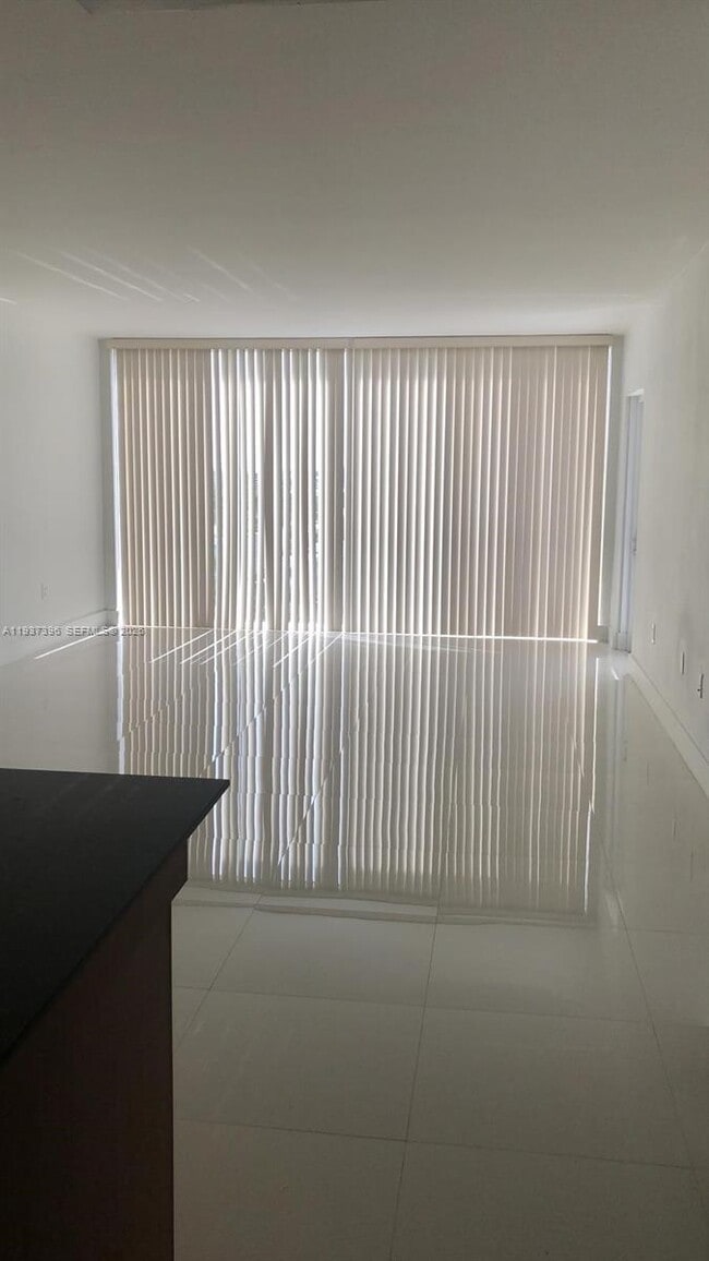 Building Photo - 10275 Collins Ave