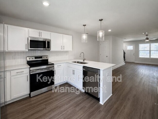 Building Photo - 1306 Woodland Vly Ln