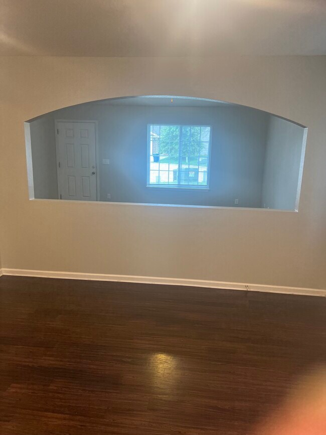 Living room from kitchen - 24498 Tupelo Ln