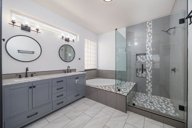 Building Photo - Welcome to this STUNNING 4-bedroom, 2.5-ba...
