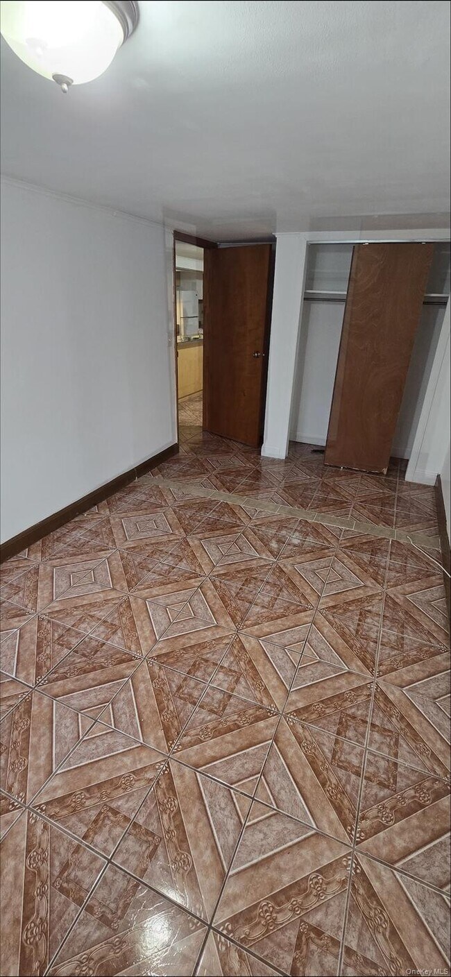 Building Photo - 25-36-36 76th St