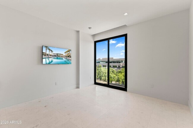 Building Photo - 6587 N Palmeraie Blvd