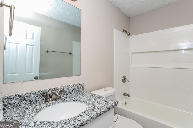 Building Photo - 9073 Woodgreen Way