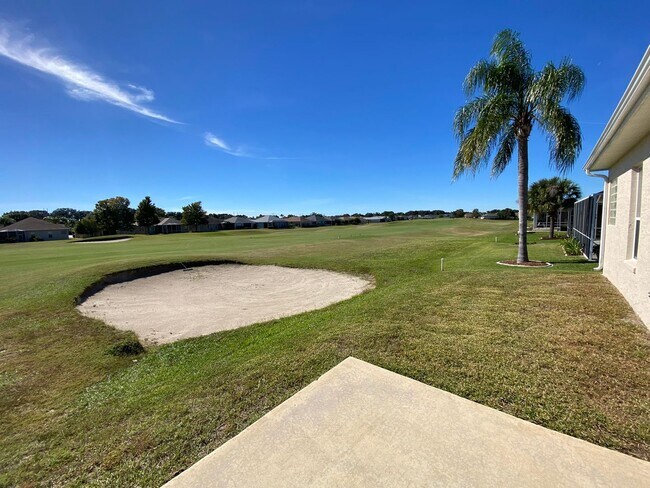Building Photo - ANNUAL Lease – Unfurnished – Golf Course Lot - Designer Home in the highly sought-after gated com...