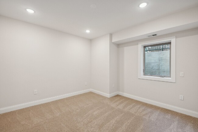 Building Photo - "NEW CONSTRUCTION 3-Bed Condo with Granite...