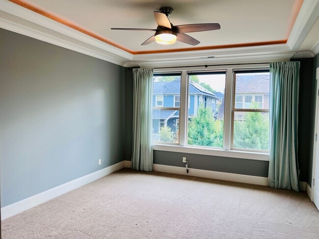 Building Photo - Custom Townhouse with Awesome Back yard