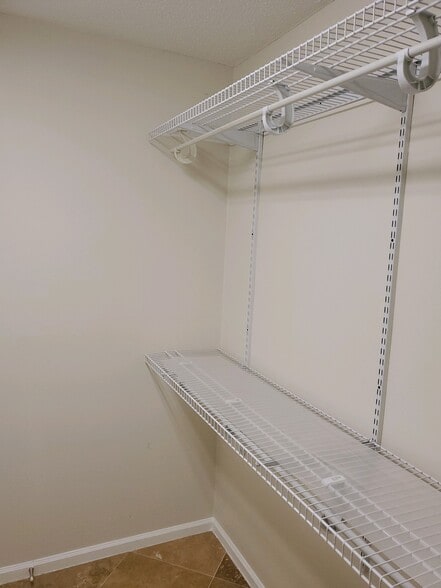 Shelves are movable - 25116 Plantation Dr NE