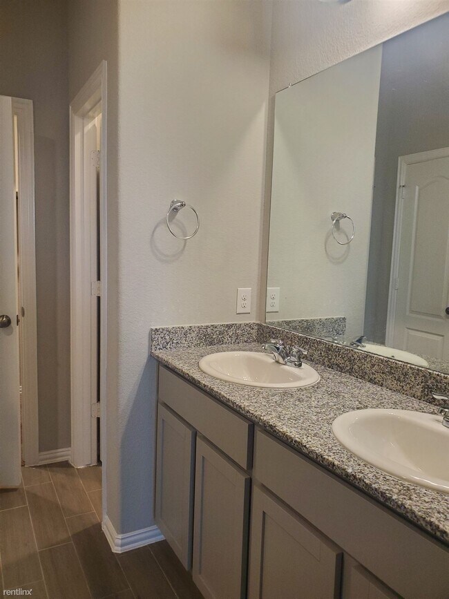 Building Photo - 4 br, 3 bath House - 7442 French Quarter Ct