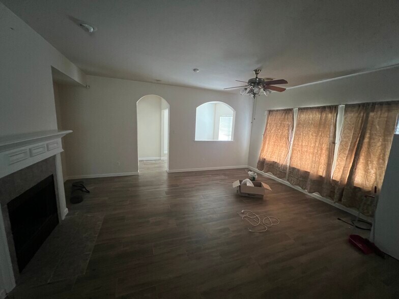 Family room with gas fireplace - 21839 Manitou Falls Ln